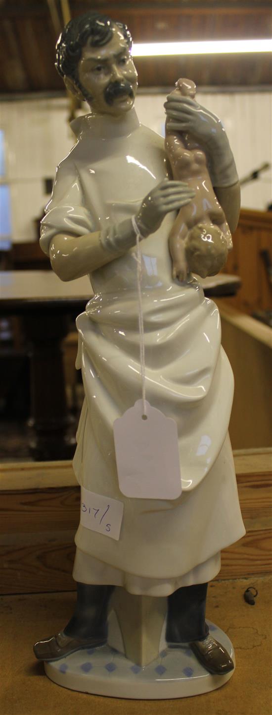 Lladro figure of a doctor & baby